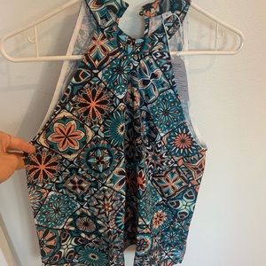 Multi-colored sleeveless top. Brand new.